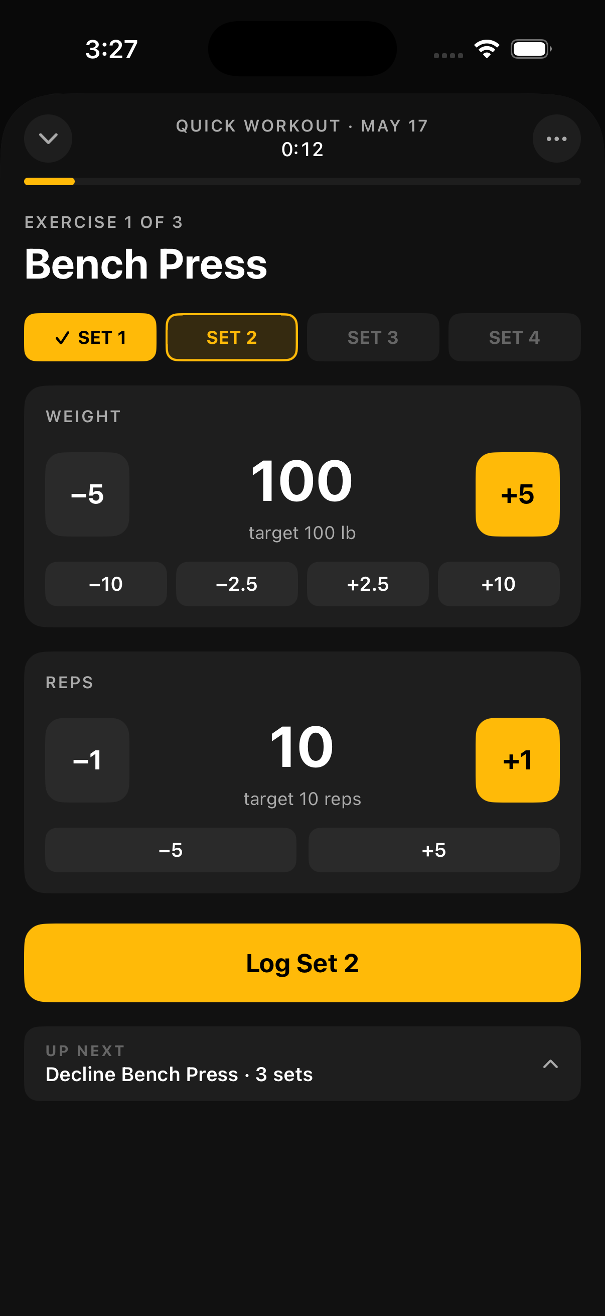 Workout view with set logging rows and active rest timer